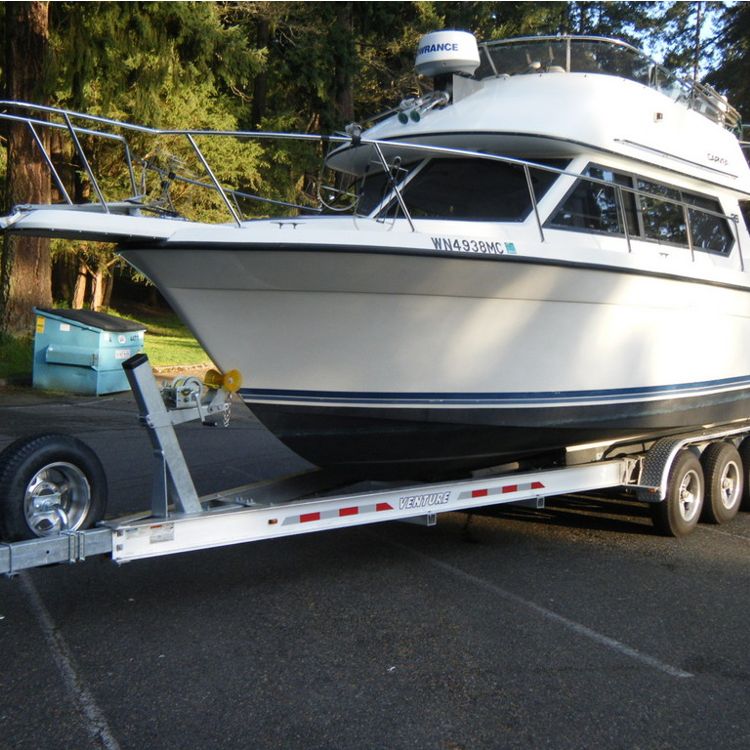 trailed boat in west palm beach Florida getting hauled to its destination